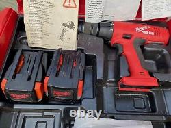 2 x Milwaukee V18 Cordless Heavy Duty Drill, Carry Cases, 3 x battery, charger