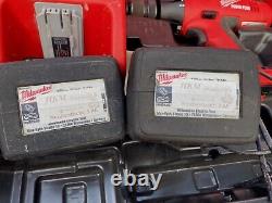 2 x Milwaukee V18 Cordless Heavy Duty Drill, Carry Cases, 3 x battery, charger